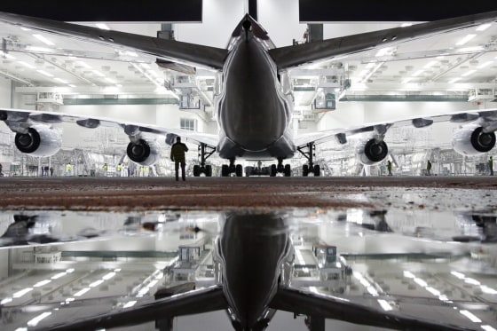 Image: New Airbus A380 airliner for Lufthansa leaves paintshop hangar at Airbus facility in Finkenwerder near Hamburg